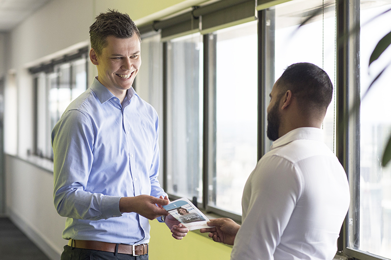 Handing over a customer service charter to a customer