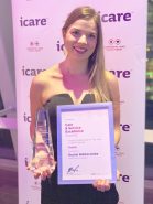 Rachel Biddiscombe WorkFocus Australia with award